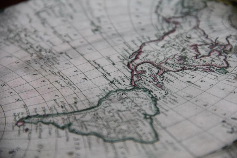 A graphic illustrating interconnected digital nodes representing decentralized finance services impacting a map of Latin America.