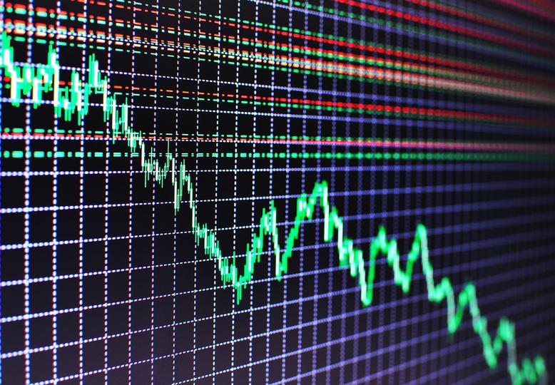 A downward trending graph superimposed on a digital abstract background, symbolizing financial loss.