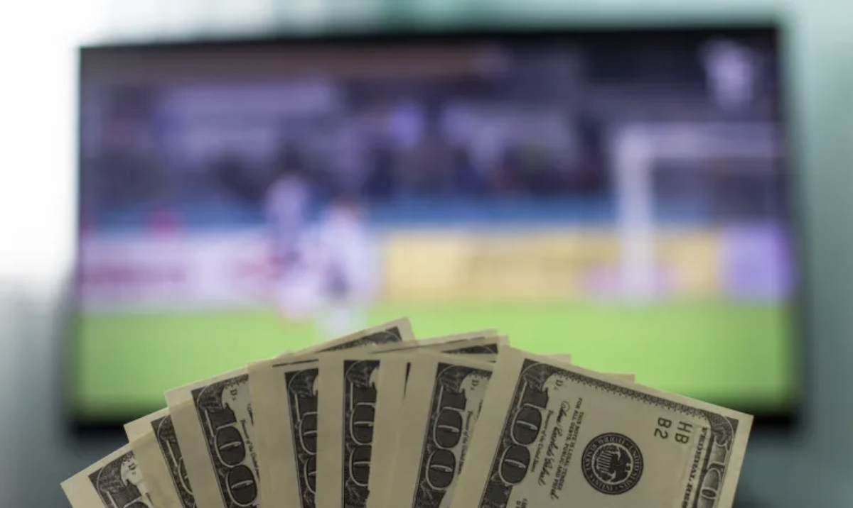A gavel striking a law book, with a digital graph overlaid, symbolizing legal action against financial technology.