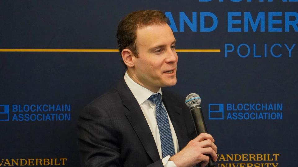 Mike Selig, CFTC Chair, speaking at a podium.