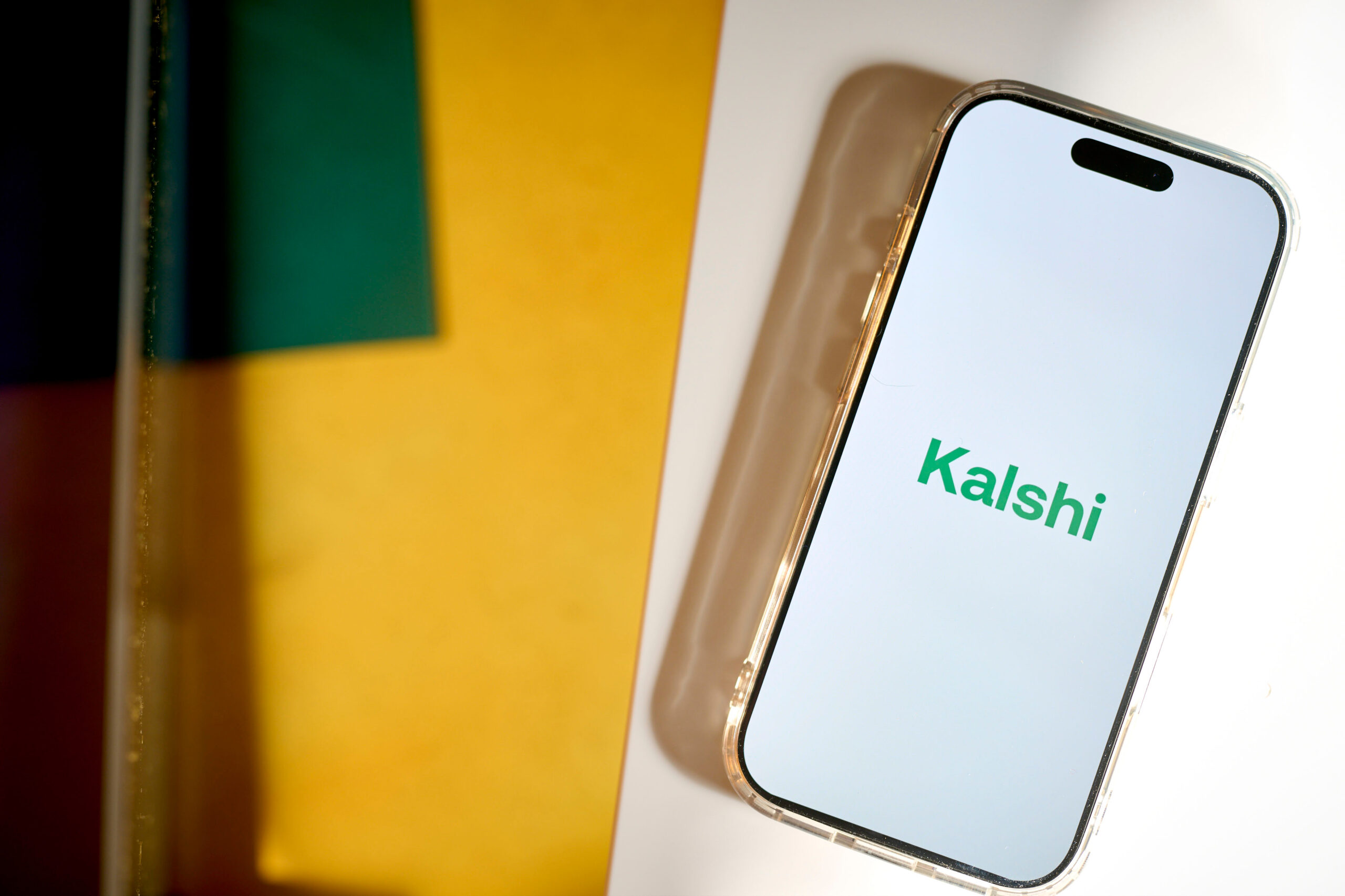 Kalshi Inc. logo displayed on a smartphone screen.