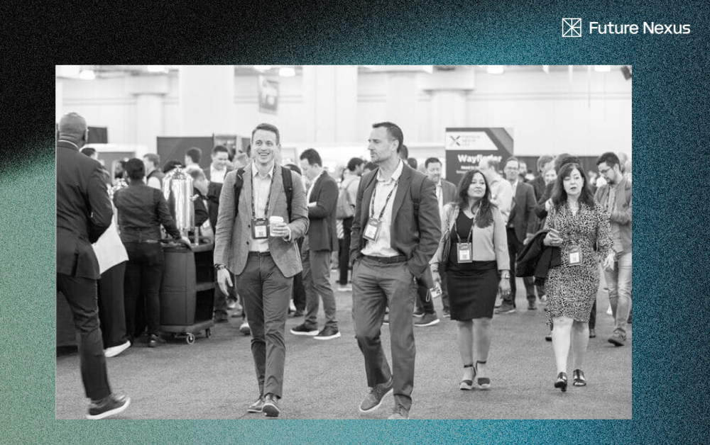 Crowded fintech conference hallway with side event signs in Las Vegas